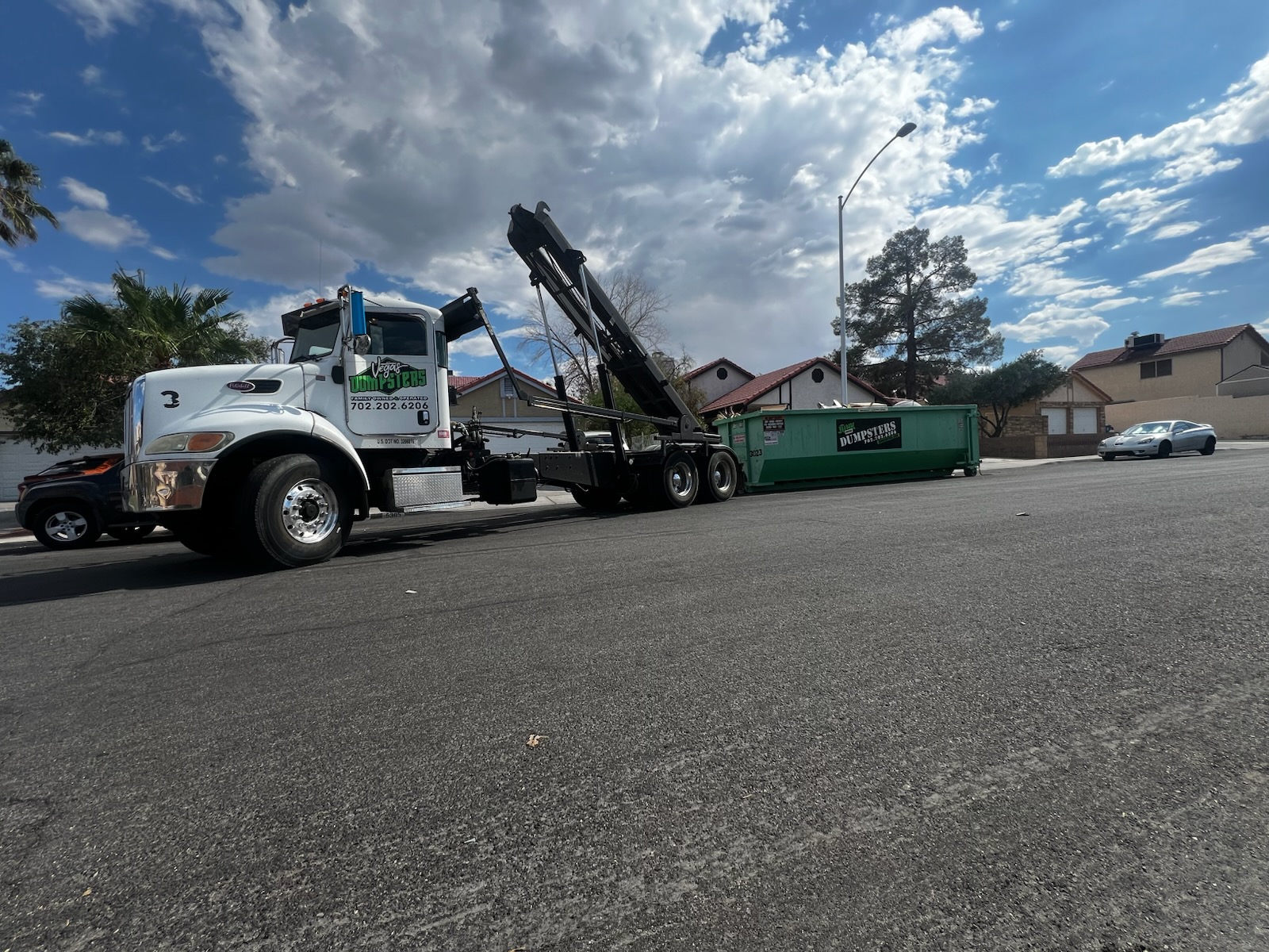Green Valley Henderson home renovation with a roll off dumpster in the driveway