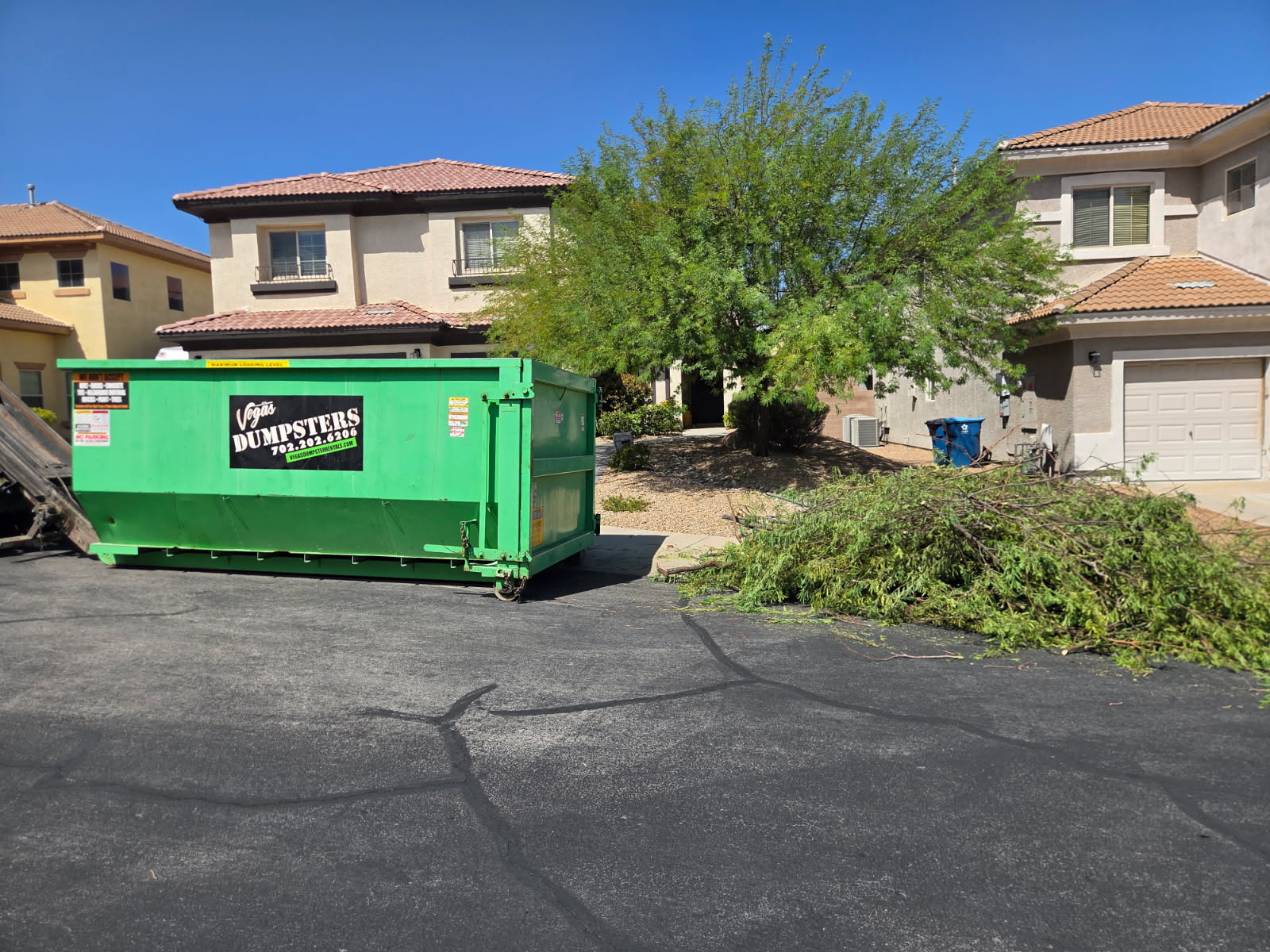 Las Vegas homeowner asking questions about residential dumpster rental