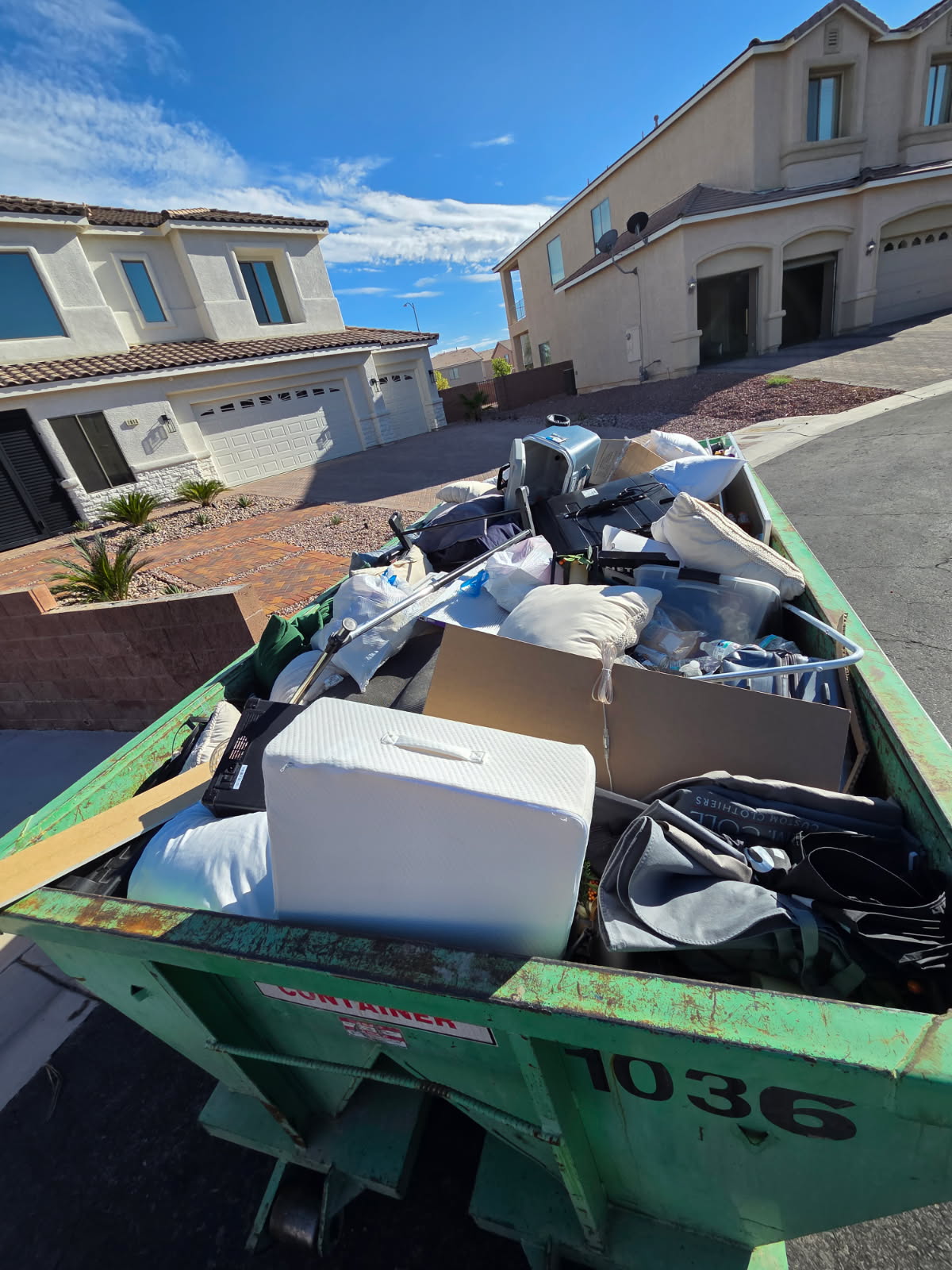 10-yard dumpster rental delivered to a Henderson Nevada home for a residential cleanup project