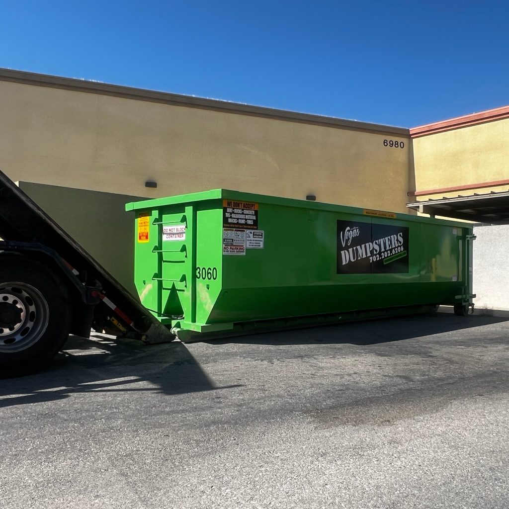 Dumpster rental at a commercial property in Henderson.